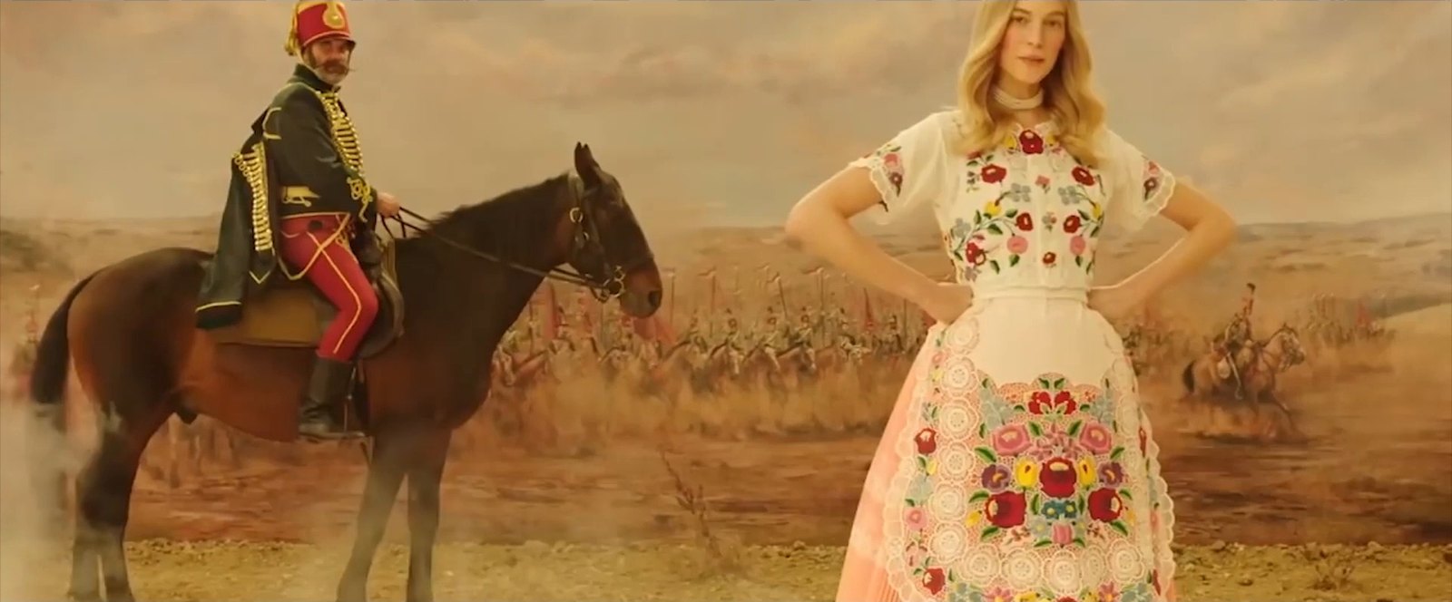 Telekom — rider and folk dress on open dunes