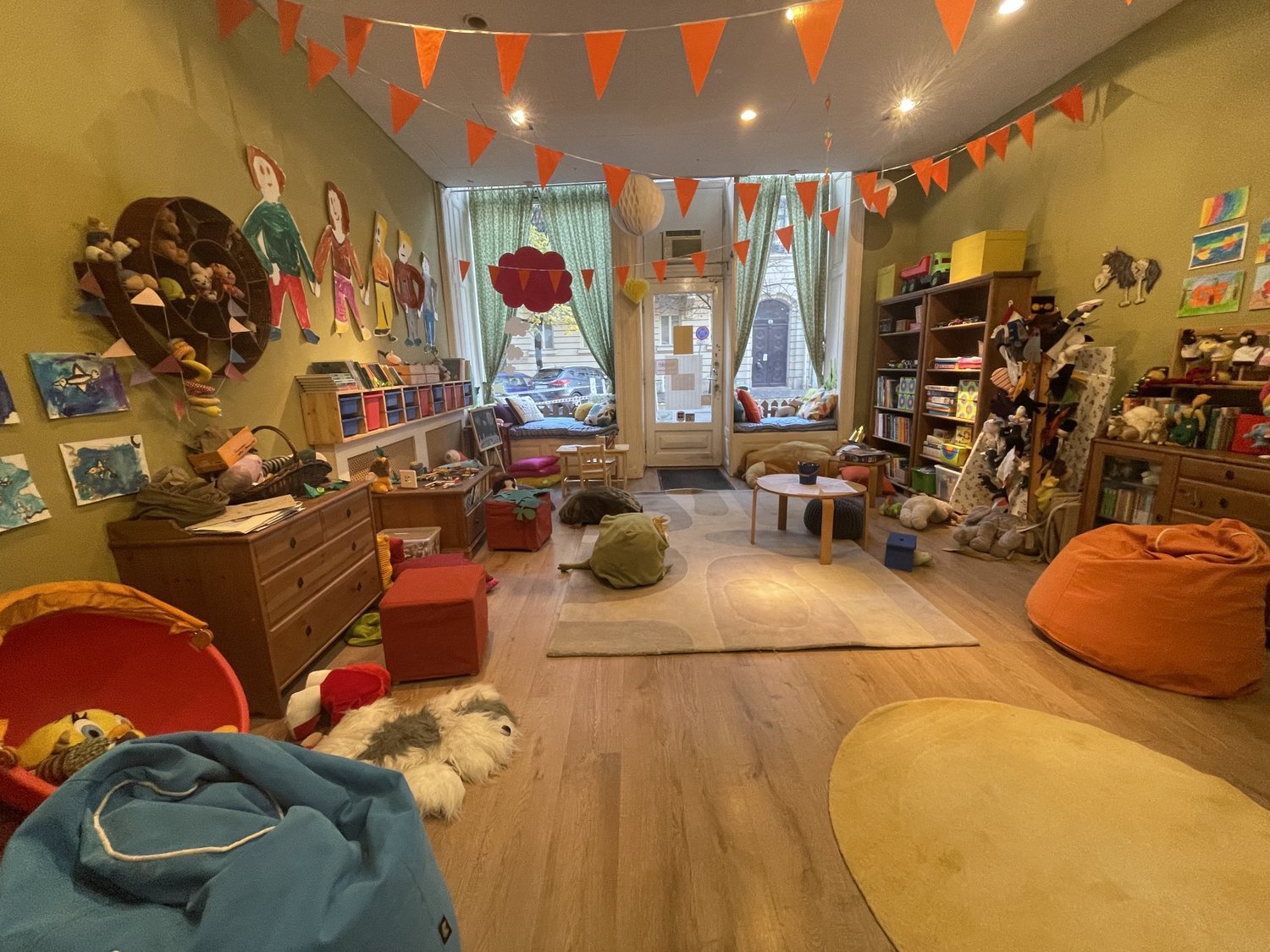 A children's playroom interior, dressed wall to wall