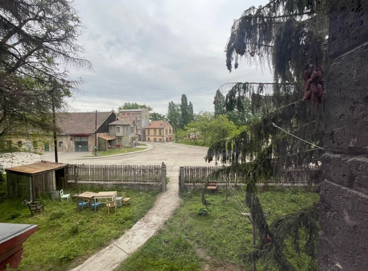 Mariana's Room — the village built from scratch, houses and a dirt road