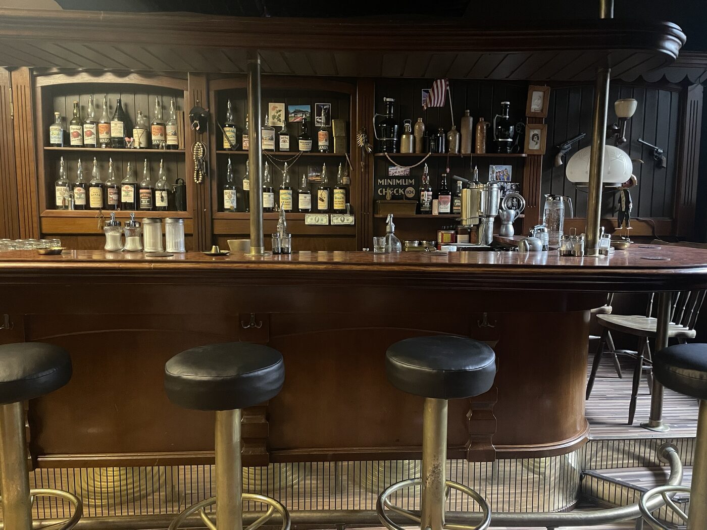 The American bar set, bottle wall and stools